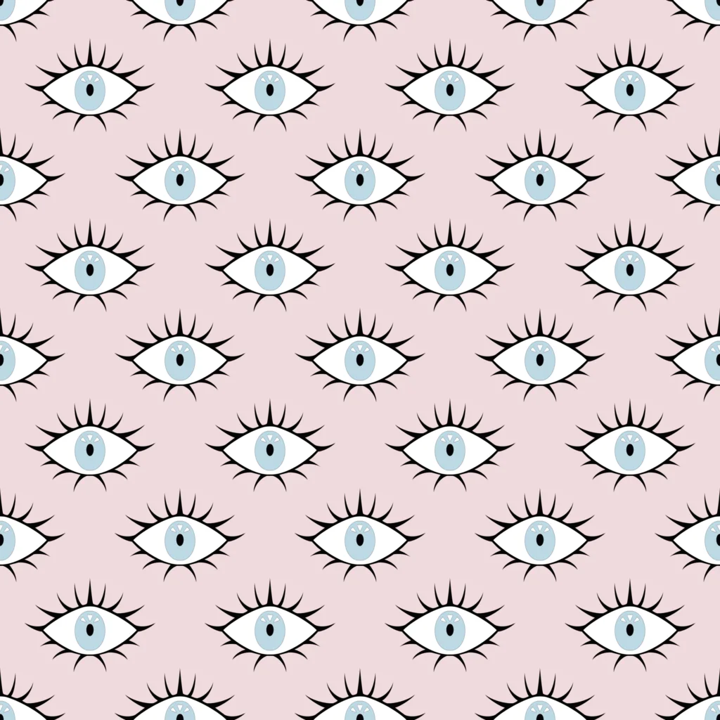 Seamless eye-print textile pattern — pale blue eyes with black lashes on a soft pink ground
